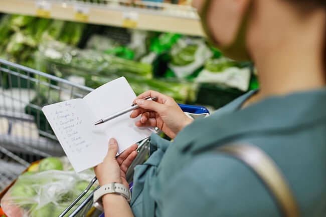 Shopping with a list in the supermarket - healthy habit